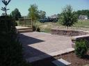 Belgard Cambridge Cobble Patio with Country Manor Seating Wall 